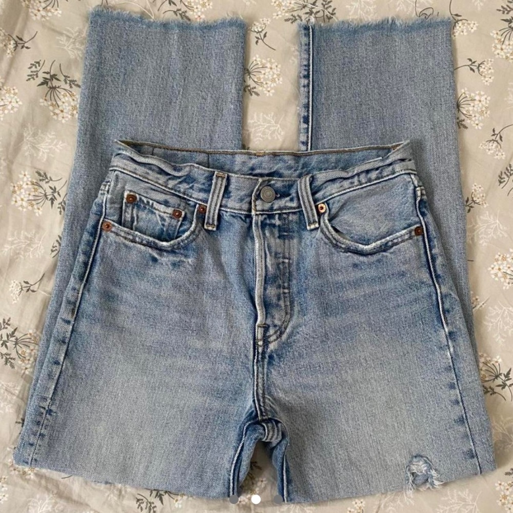 Levi’s Light-Wash Distressed Straight Leg Jeans